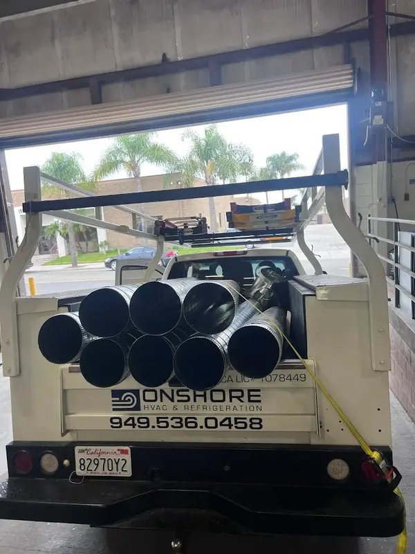 Onshore Mechanical service truck loaded with ductwork
